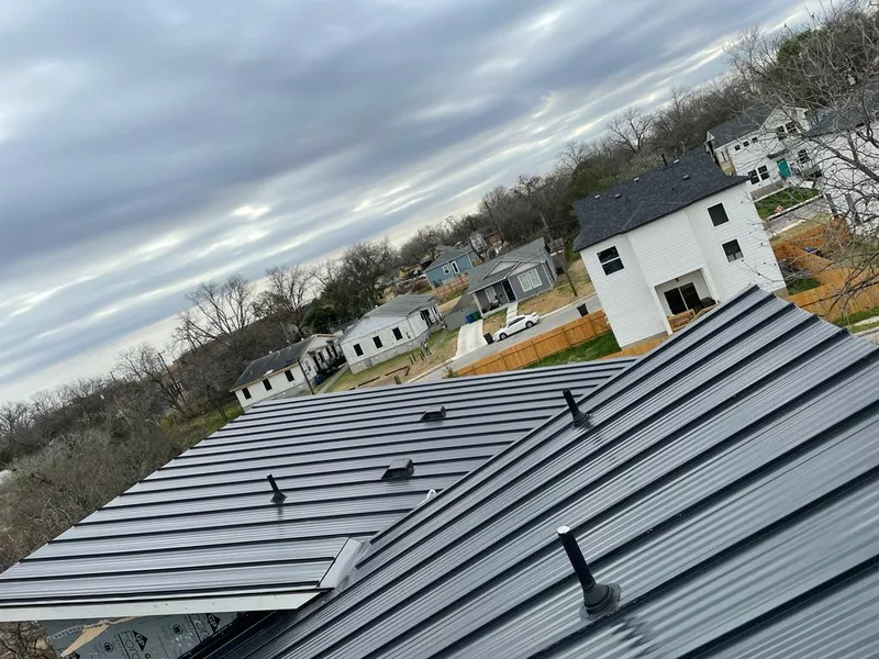 Standing seam metal roof panels with vents for Skylight Repair in Lyons